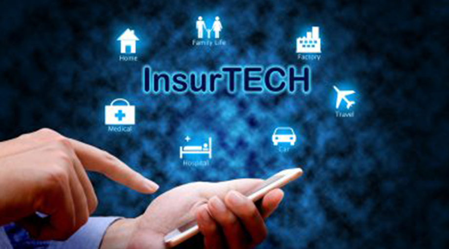 A person using a smartphone with "InsurTECH" and icons for home, family, factory, travel, medical, hospital, and car, symbolizing tech-driven insurance.