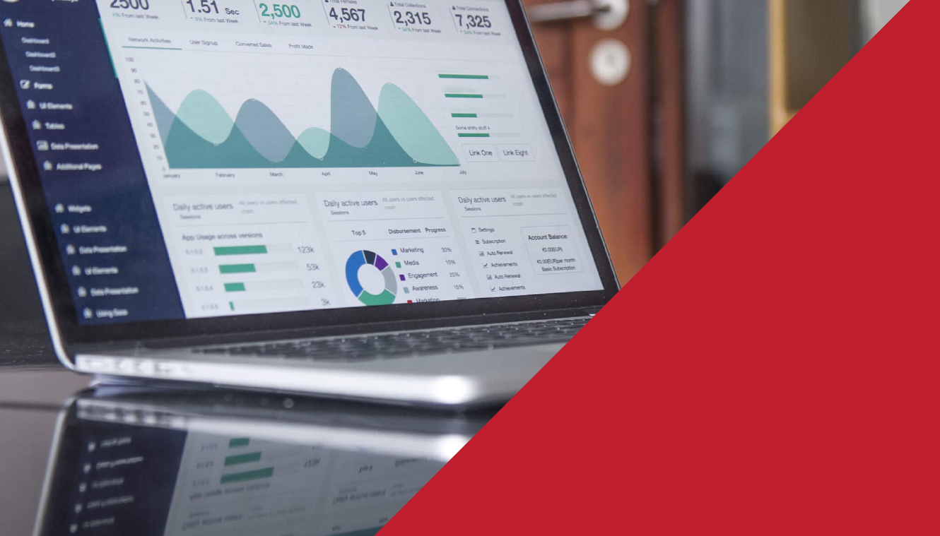 A laptop displaying analytical charts and graphs with data on a desk. The screen shows line and bar charts. A bold red diagonal band overlays the image.