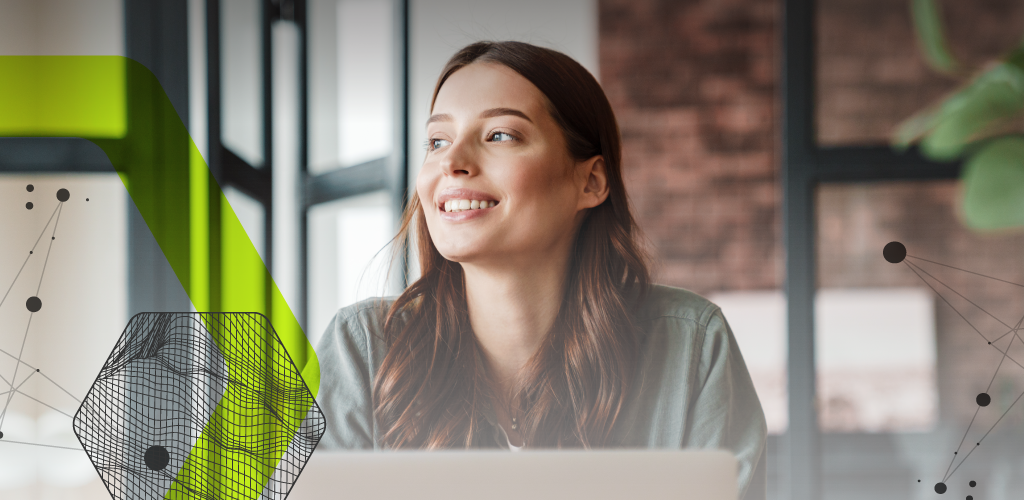 A woman with long brown hair smiles softly while seated at a desk in a modern office. Abstract green graphics and wireframes overlay the image, adding a tech vibe.