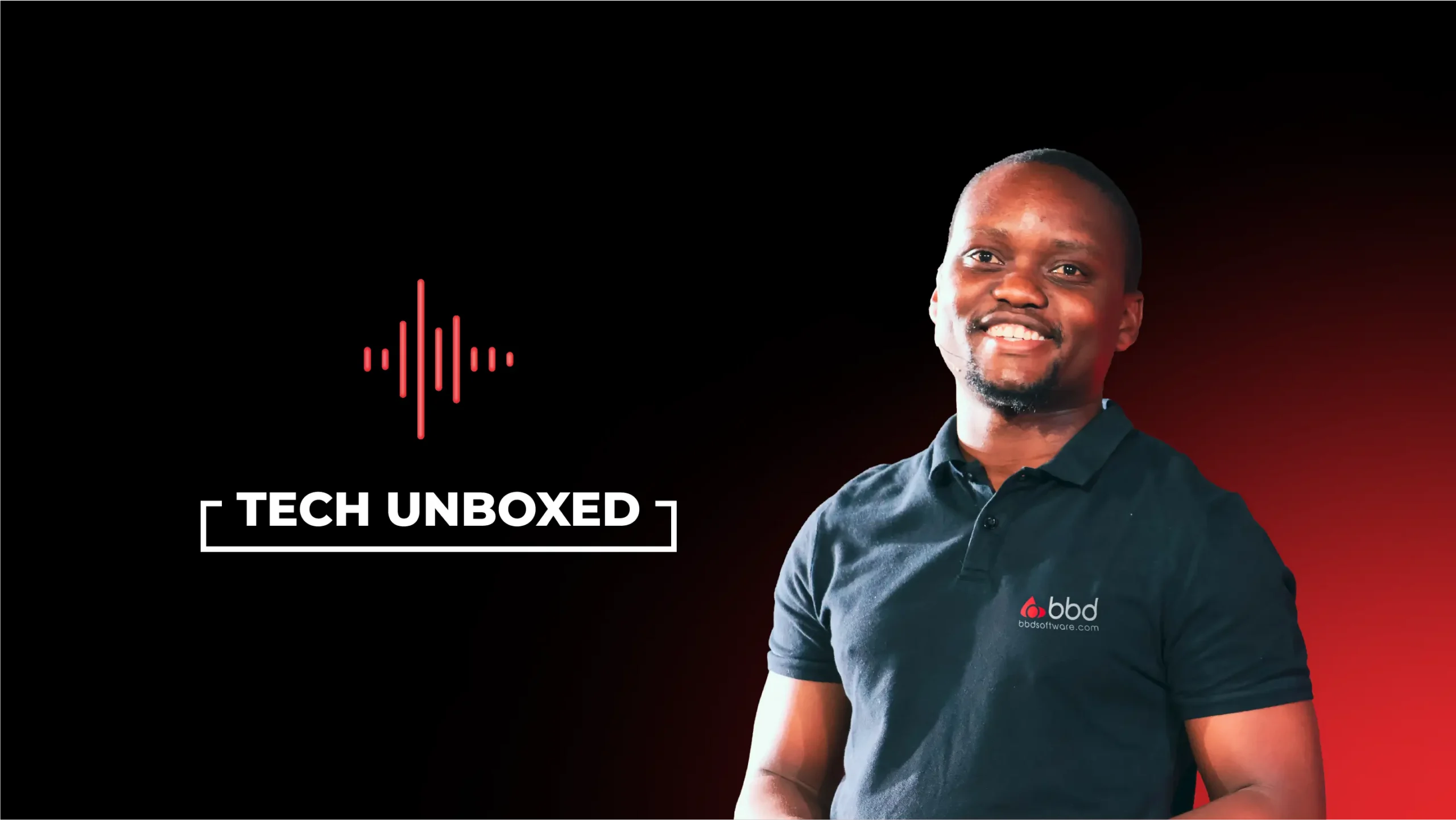 Man in a black polo with a logo smiles against a red gradient background. Beside him, "Tech Unboxed" text and soundwave icon on a black backdrop.